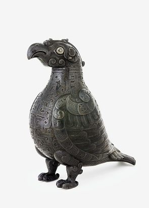 lidded bronze wine vessel in the shape of a stylized dove