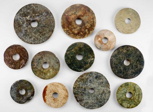 A variety of jade bi (circular jade disks with a hole in the center) from the museum's Chinese collection.