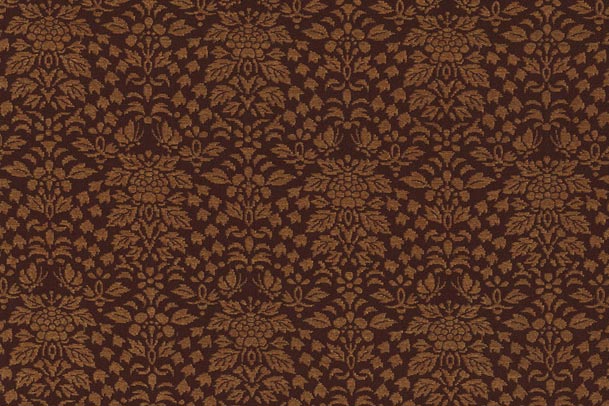 orange floral pattern on a rust-brown field