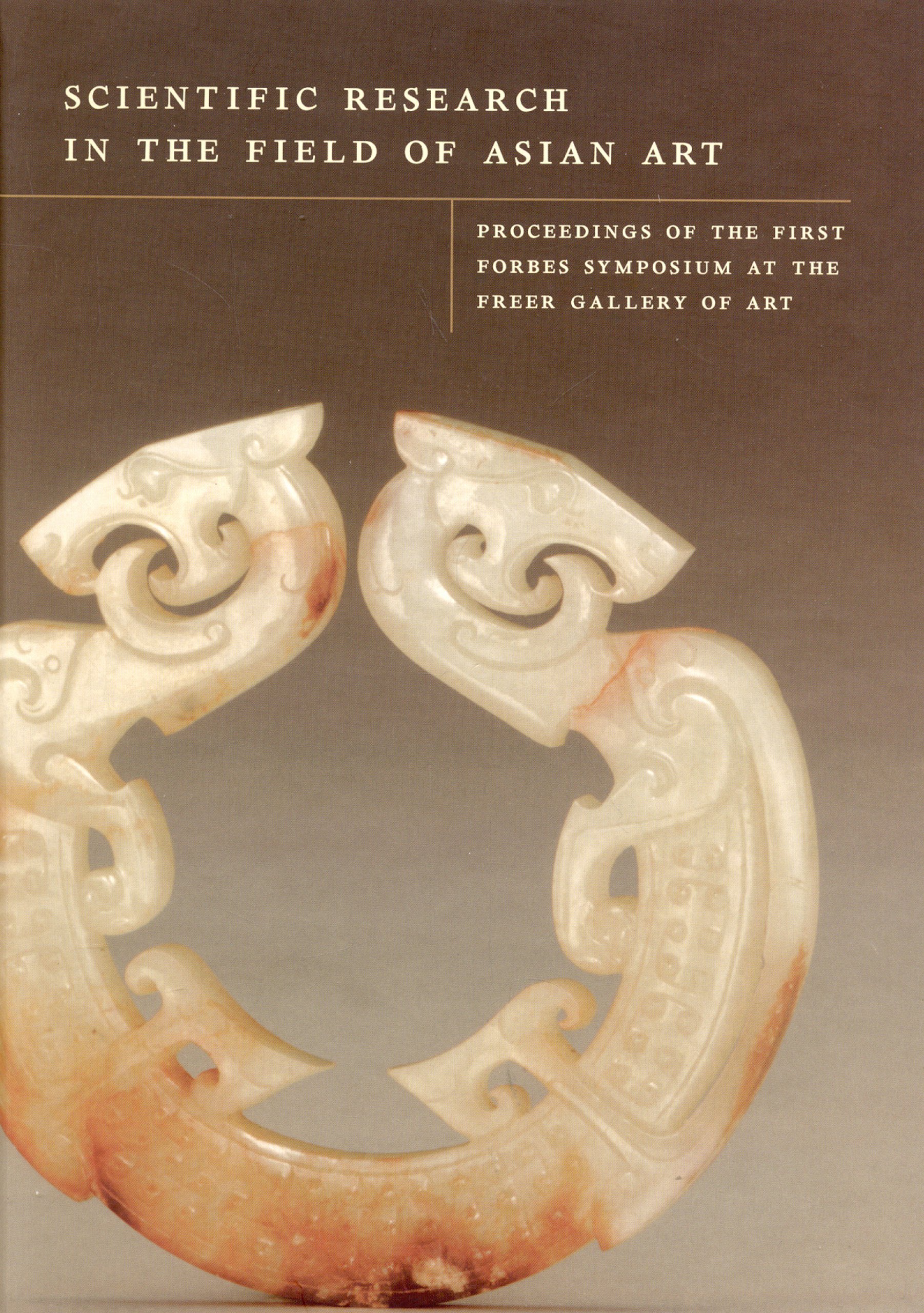 cover of the First Forbes Proceedings showing a carved, circular white jade.