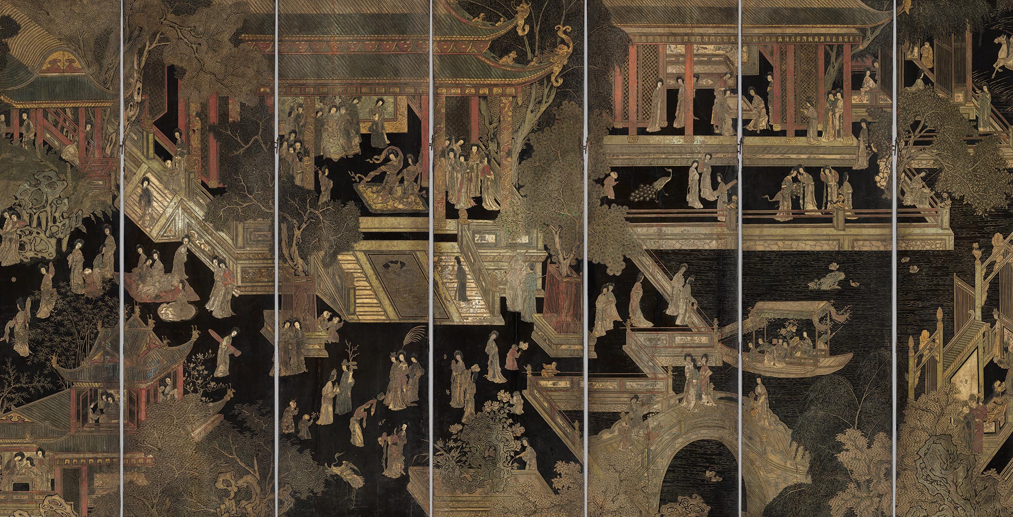 A set of narrow, vertical panels arranged side by side. An expansive, detailed scene of palace buildings and grounds, populated by many figures, is rendered in multi-tonal inlays and black lacquer.