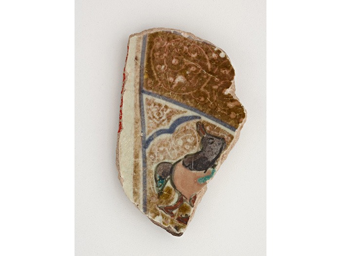 A sherd decorated with luster and mina’i.