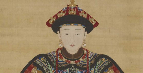 Portrait of a Chinese woman in extravagant clothes and jewelry.