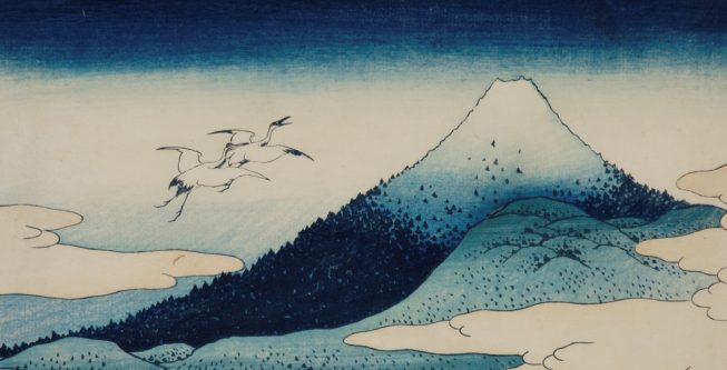 Print depicting a mountain in shades of blue and white. On the left, two white feathered birds are in flight.