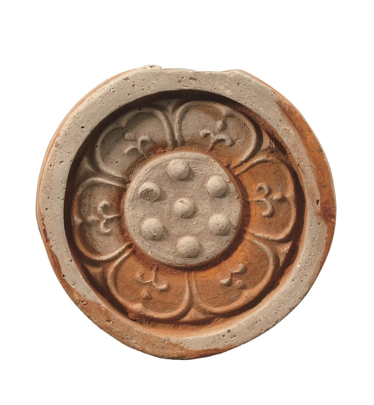 circular tile with a smaller circular flower design within a thicker border