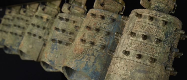 detail view of 6 bells with dragons