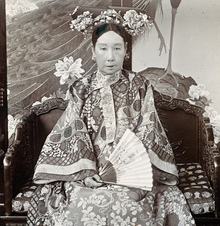 Black and white portrait of Cixi sitting.