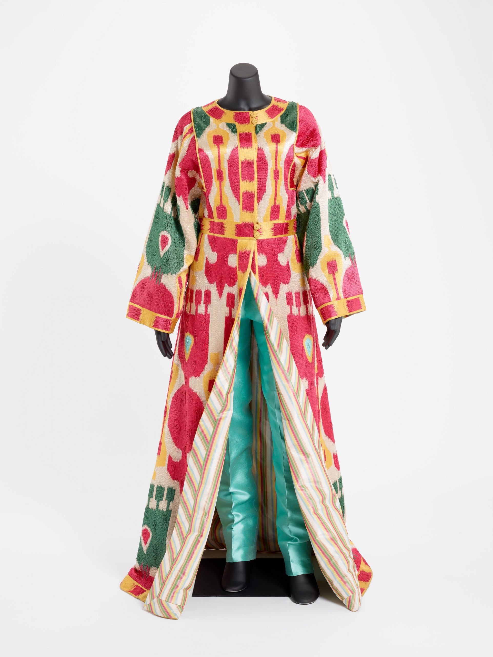 Long multicolored silk robe with green silk pants.