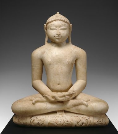 Marble sculpture of Jina in lotus posture with each foot folded onto the opposite thigh