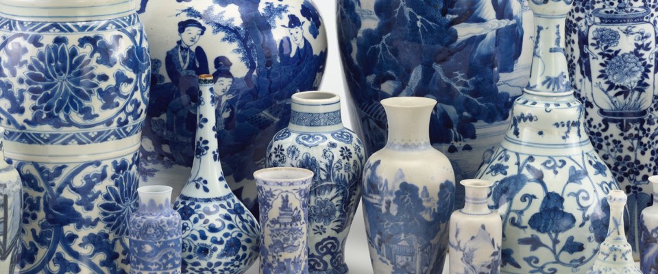 a group of blue and white porcelain vessels