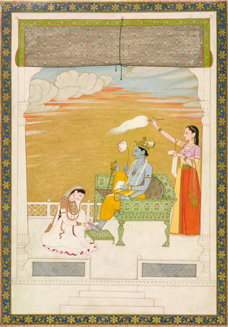 A kneeling woman massages the feet of a seated blue man, another woman standing behind him.