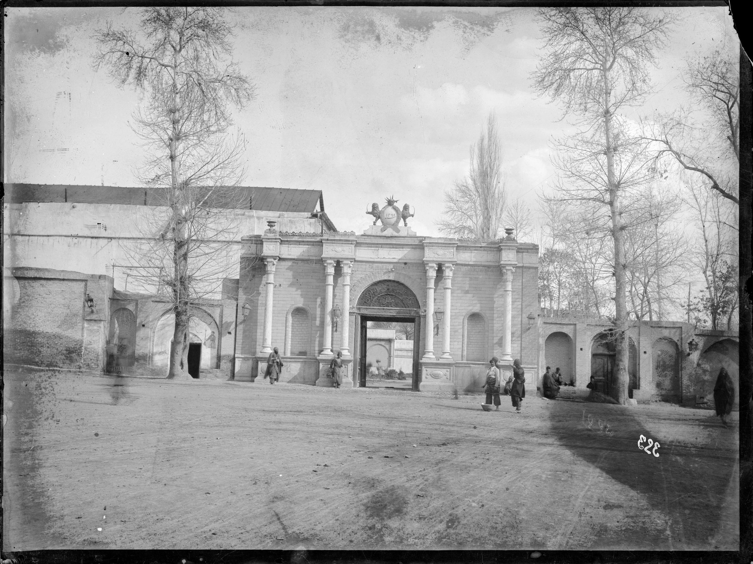 Grayscale photo of a wall and archway with texture superimposed on top.