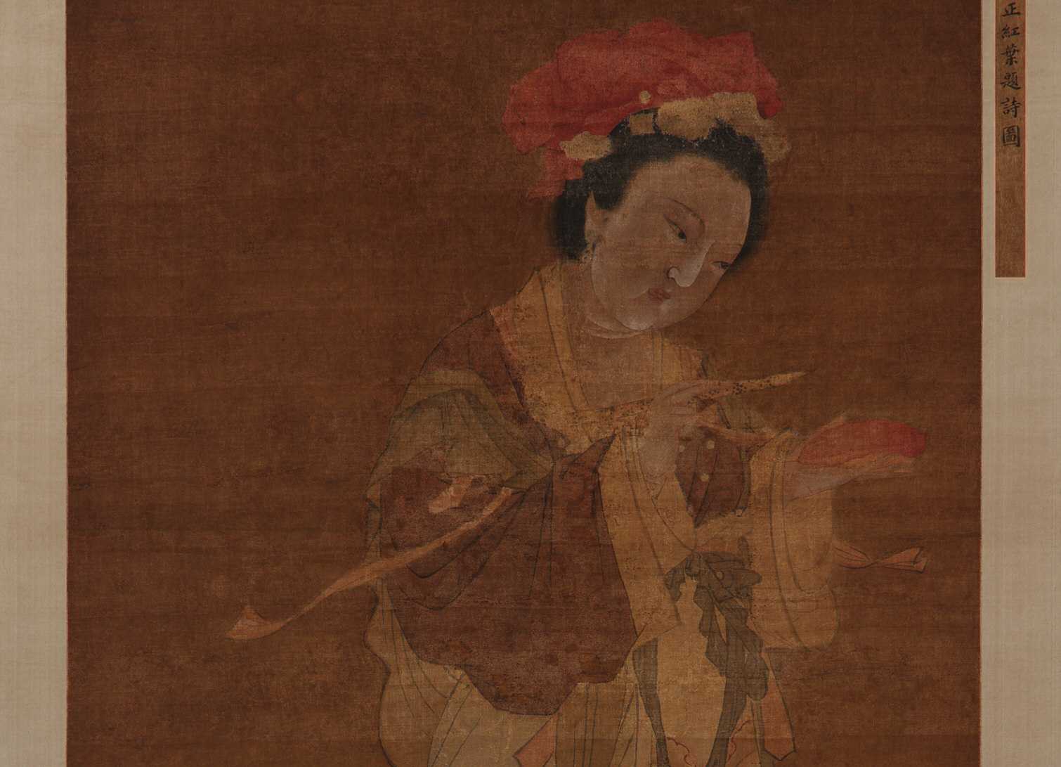 Detail of a painting depicting a Chinese woman dressed in a robe writing on a crimson leaf.