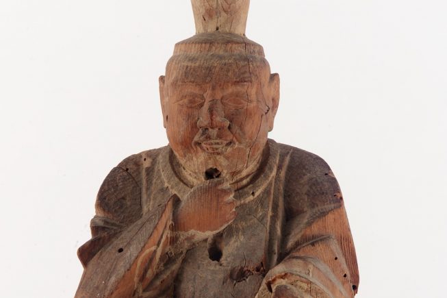 detail, seated male figure in court dress