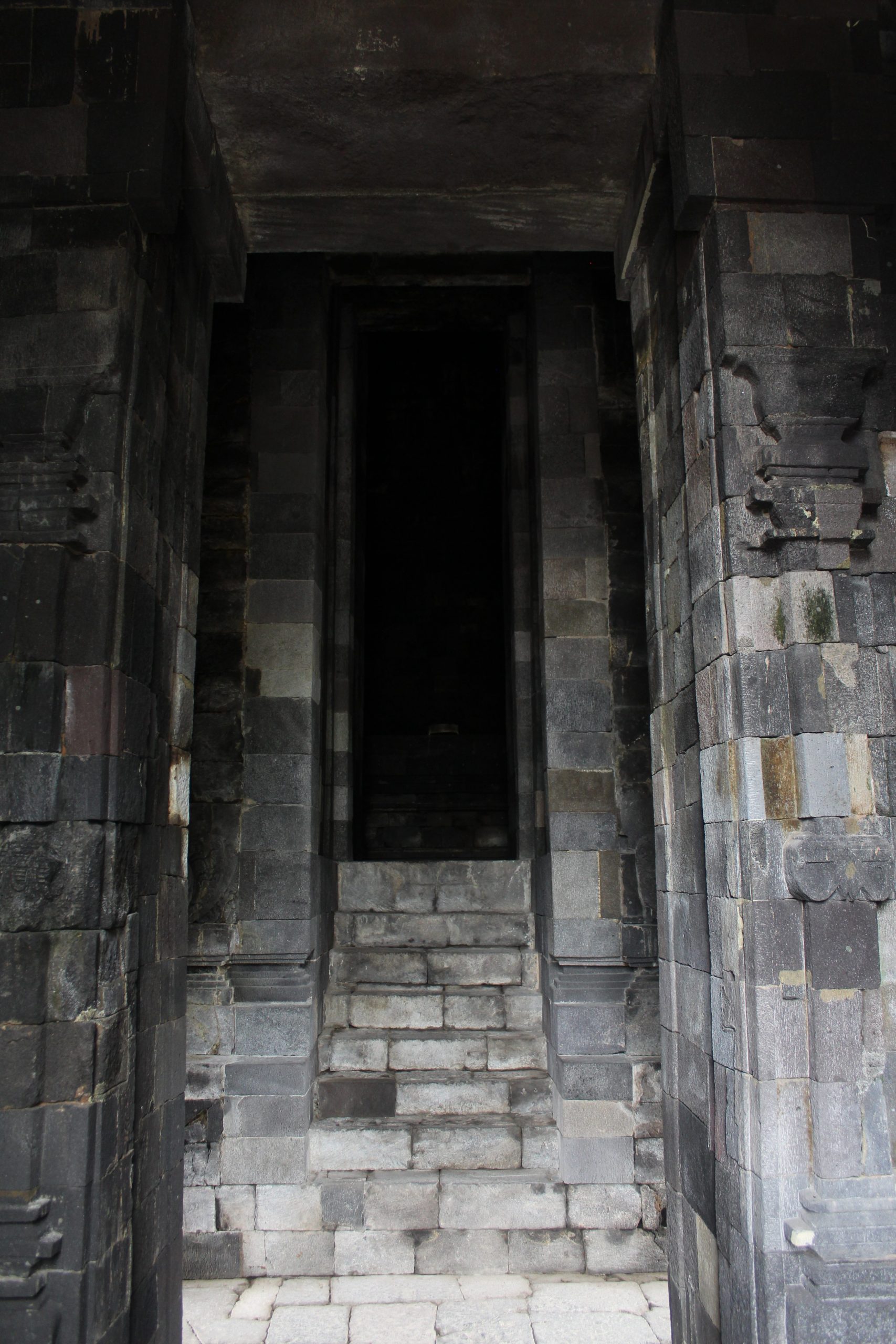 Staircase leading up to dark shrine interior