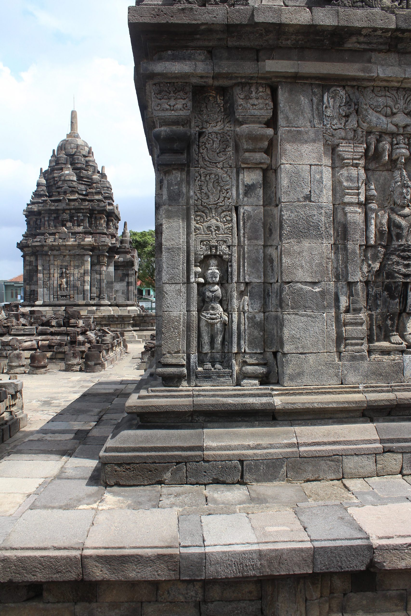 Finely carved shrine walls, with smaller shrine behind