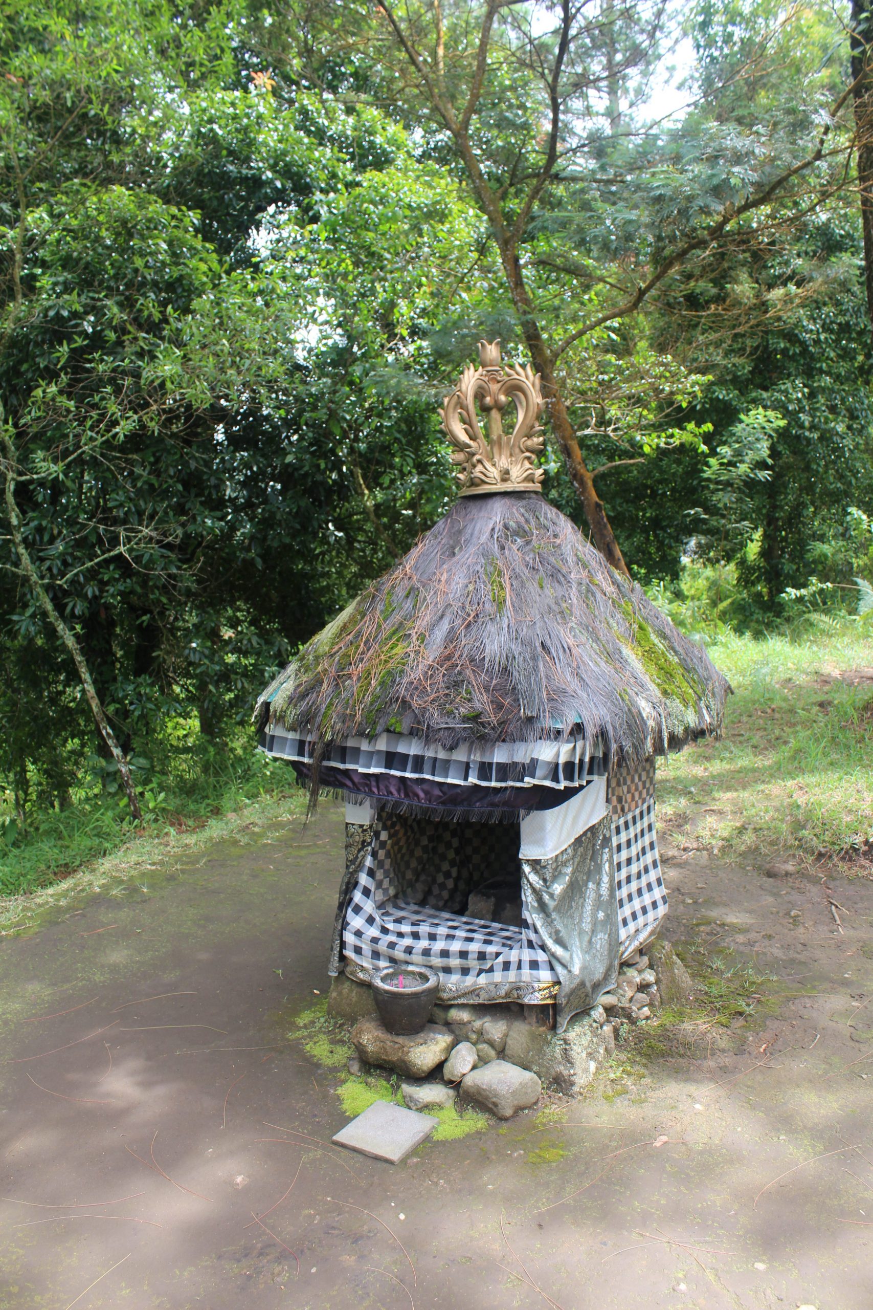 Small shrine with thatch roof