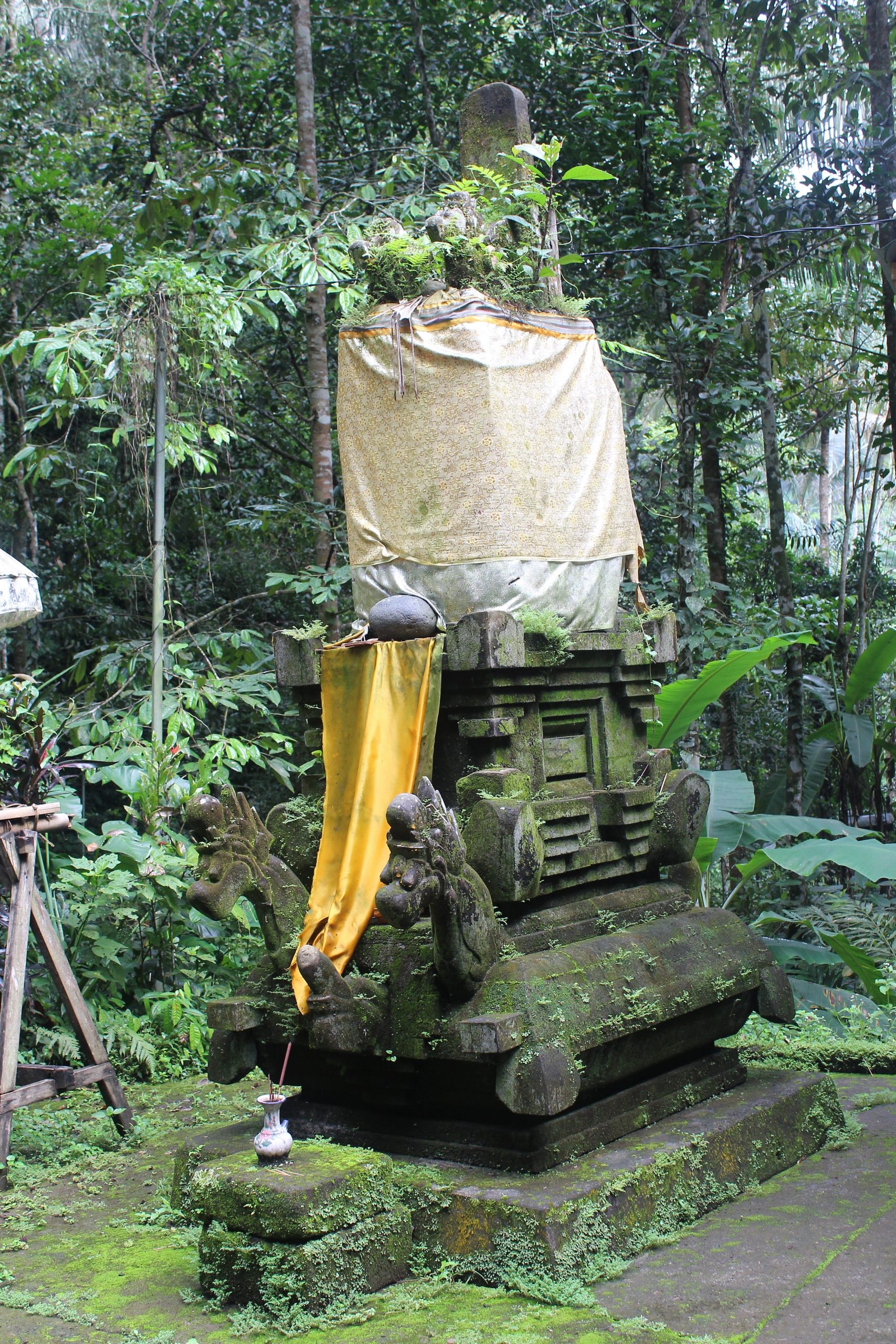 Sculpture in a tall shrine with nagas