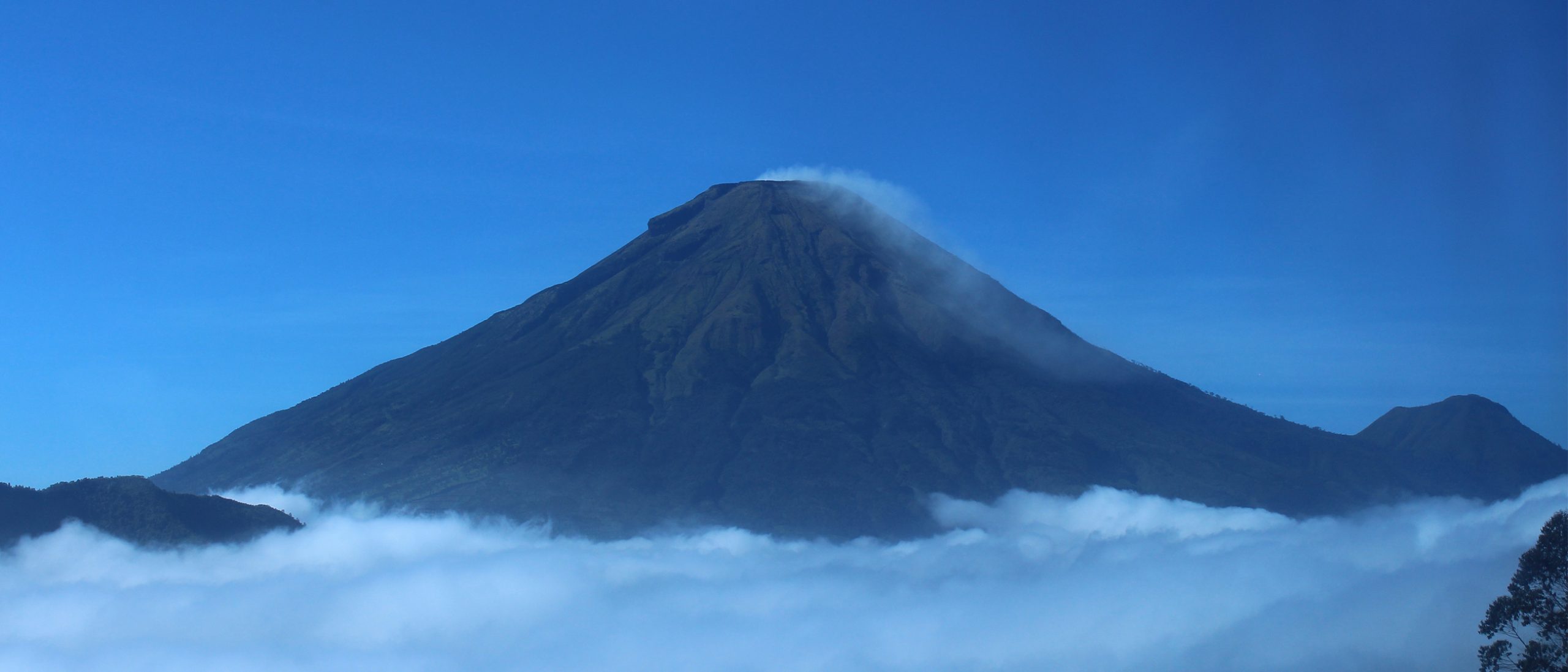Volcano top through the clouds