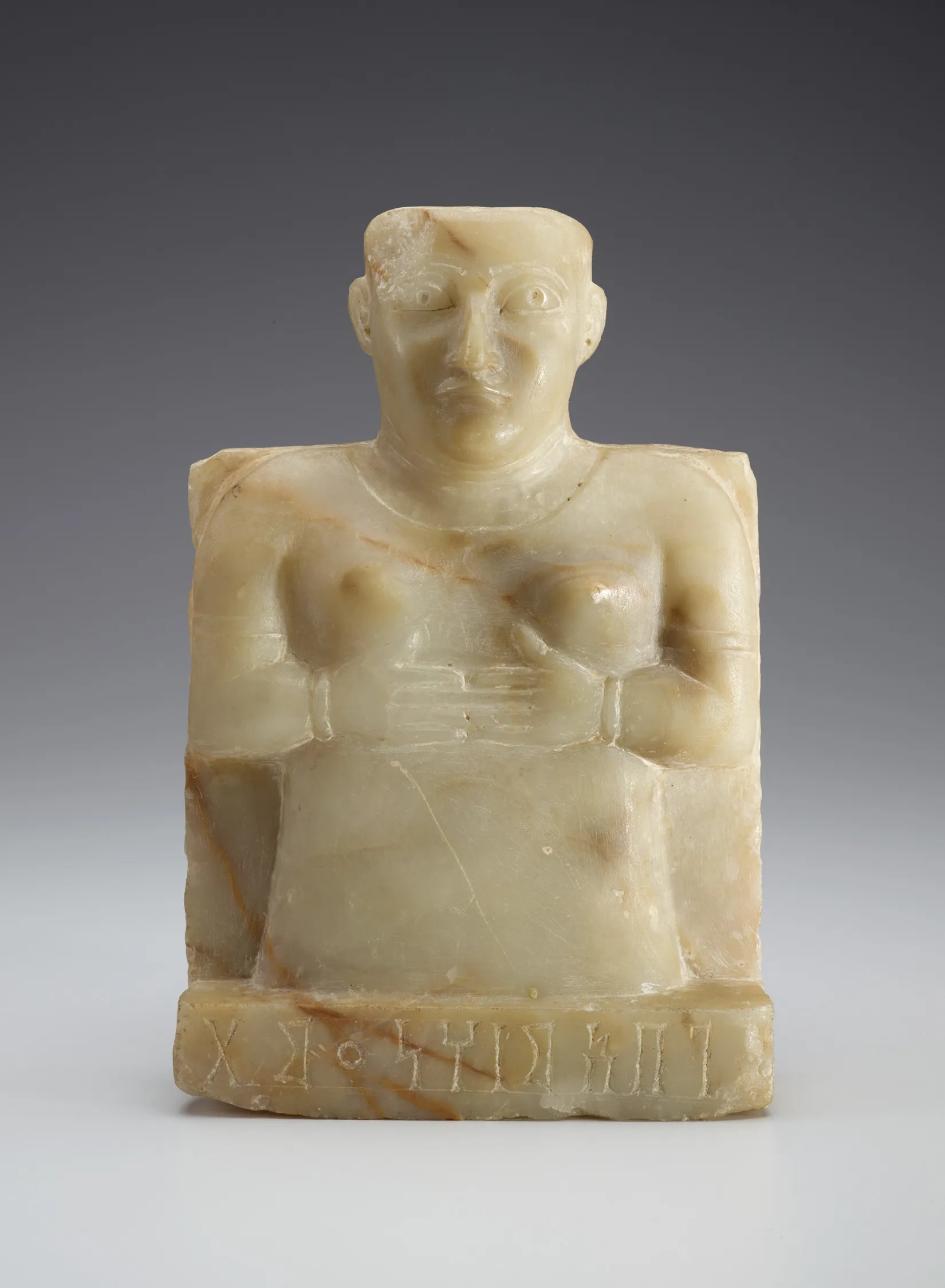 carved head and upper torso