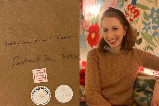 Side-by-side image of handwriting and collectors' stamps on brown paper, and a portrait photo of a smiling woman with red hair pulled back with a headband and wearing a brown sweater.