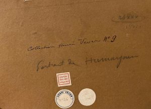 Handwritten notes and three collectors' stamps against a brown paper background.