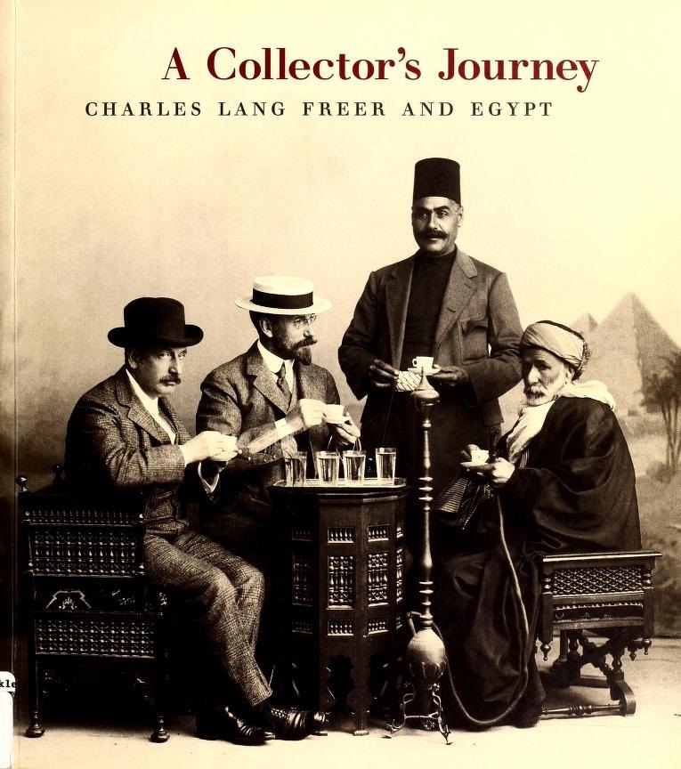 Book cover of A Collector's Journey. Cover image: A sepia photograph of four men around a small circular table drinking tea. In the far distance, on the right of the cover, there are two pyramids and palm trees