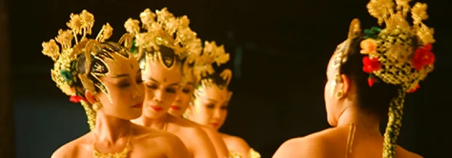 Dancers wearing gold headdresses