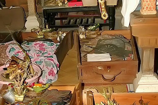 Puppet boxes on a ceremonial platform.