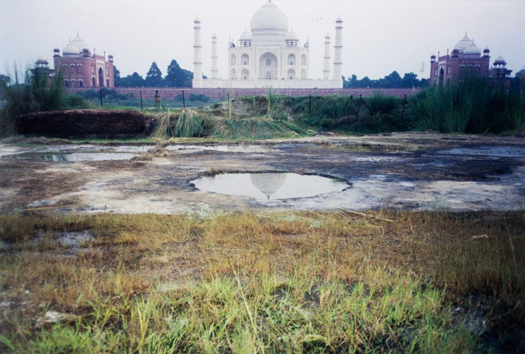 photograph of the Taj Mahal and the Mehtab Bagh pool of water