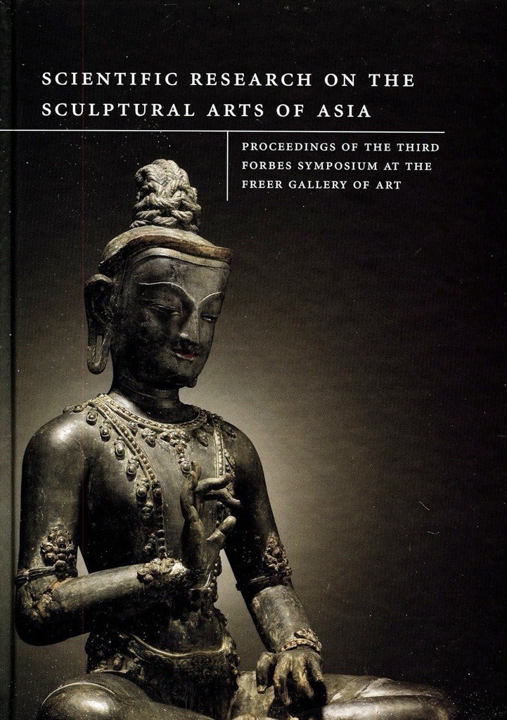 Cover of Scientific Research on the Sculptural Arts of Asia: Proceedings of the Third Forbes Symposium at the Freer Gallery of Art. Cover image: close up of a Buddhist statue sitting cross-legged, eyes downturned, right hand raised so that the thumb and index fingers are touching