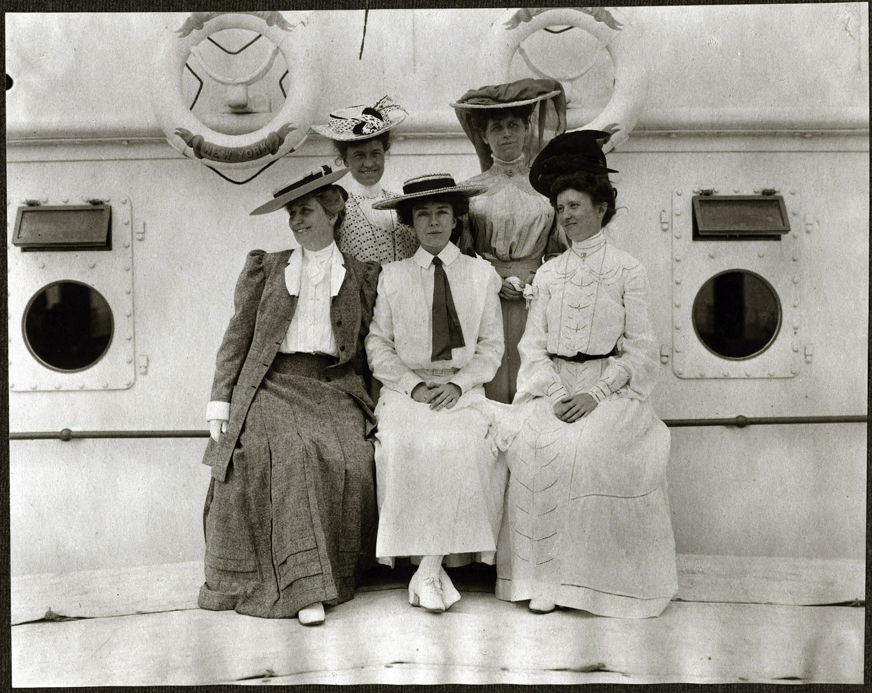 A group photograph of Alice Roosevelt and female passengers on the SS Manchuria.