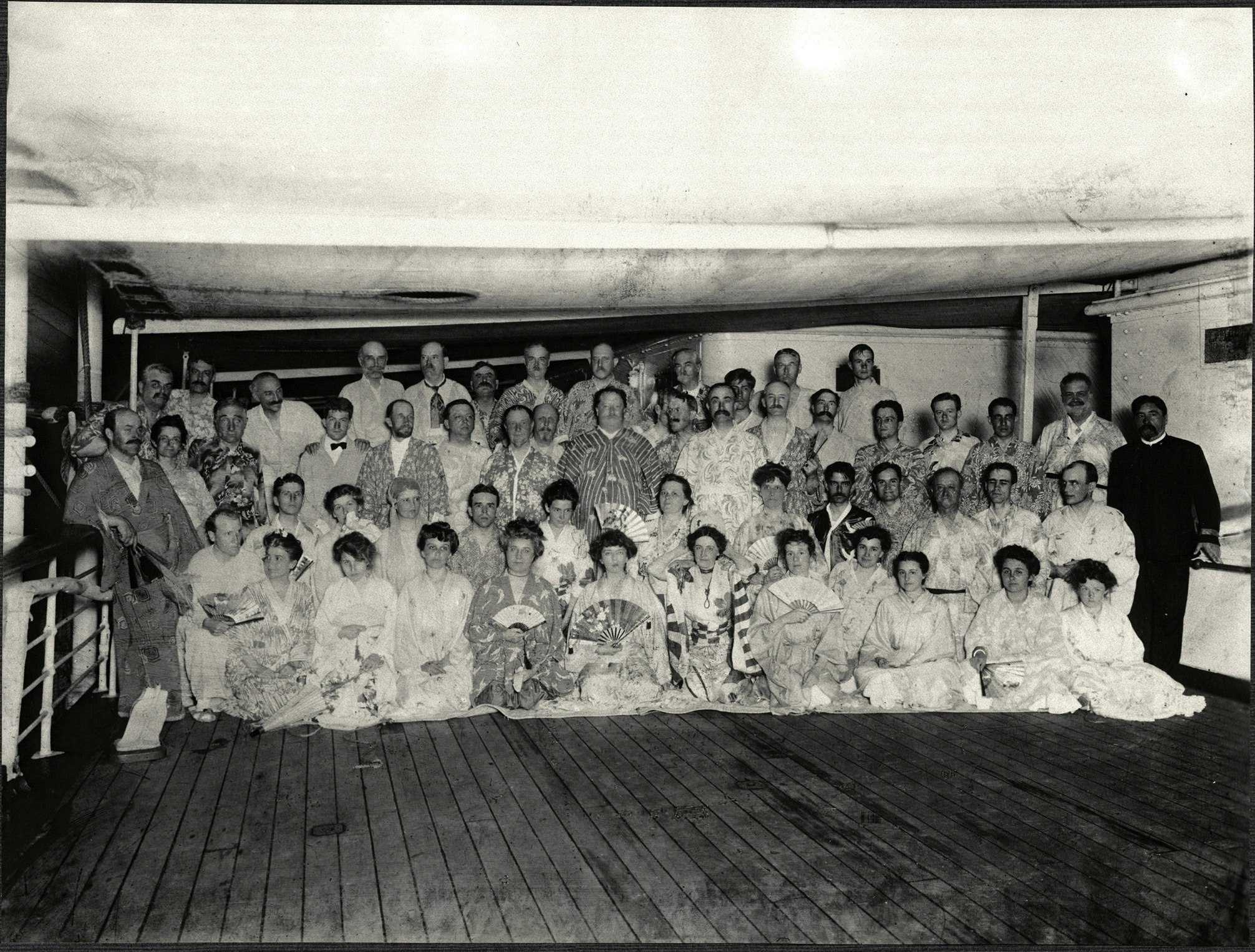 Passengers aboard the SS Manchuria dressed in kimono for an evening party