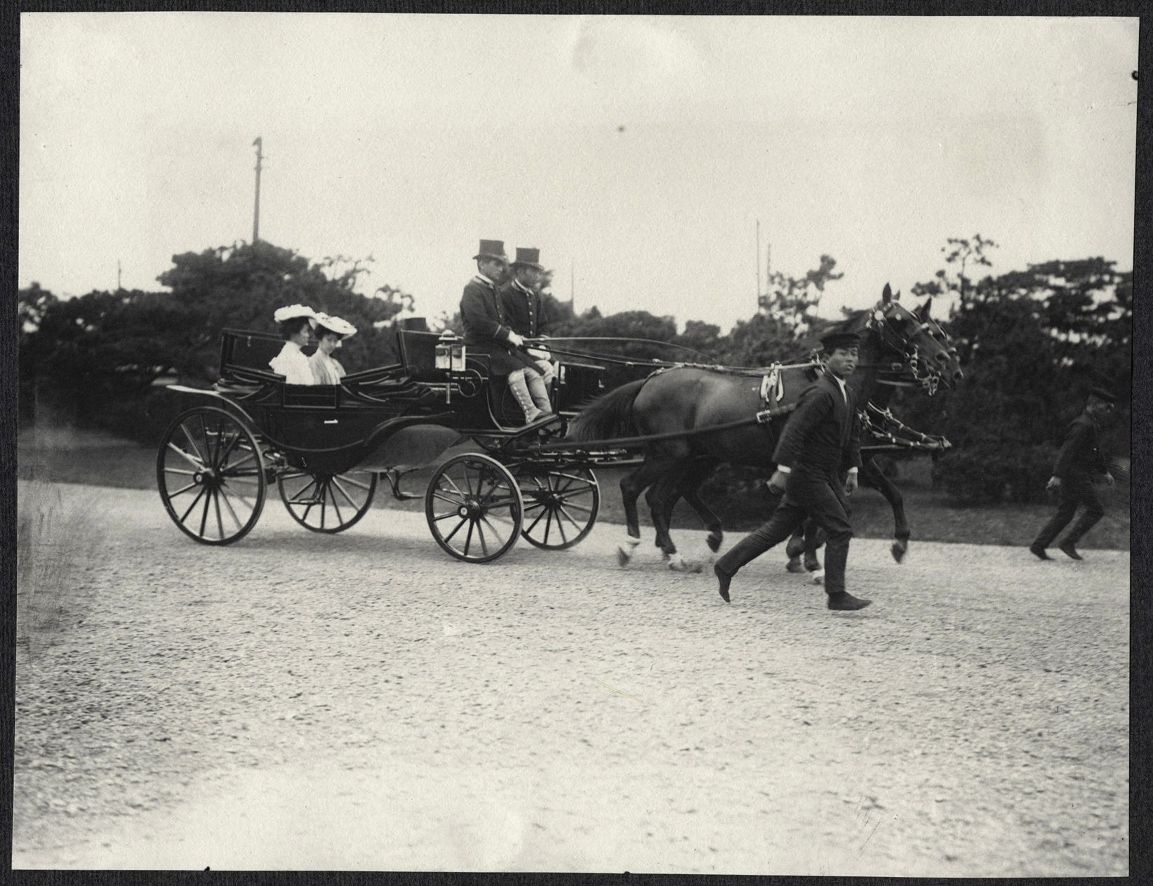 Tokyo: Two Japanese ladies riding in a carriage