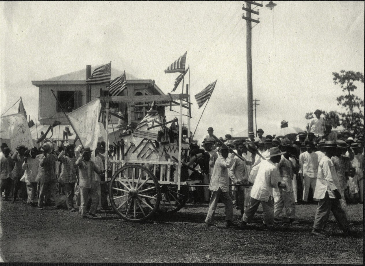 Iloilo City: Parade of a wagon displaying iron tools