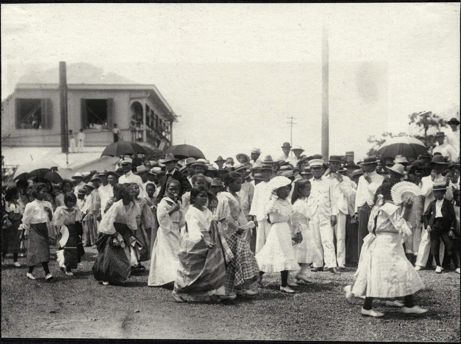 Iloilo City: Parade of young girls, possibly a school group