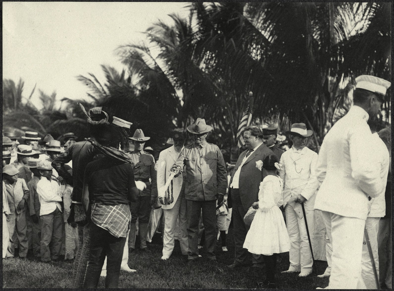 Zamboanga: Wiiliam H. Taft watches as the Datu Piang presents a ceremonial sword to Major John Finley at Zamboanga parade grounds