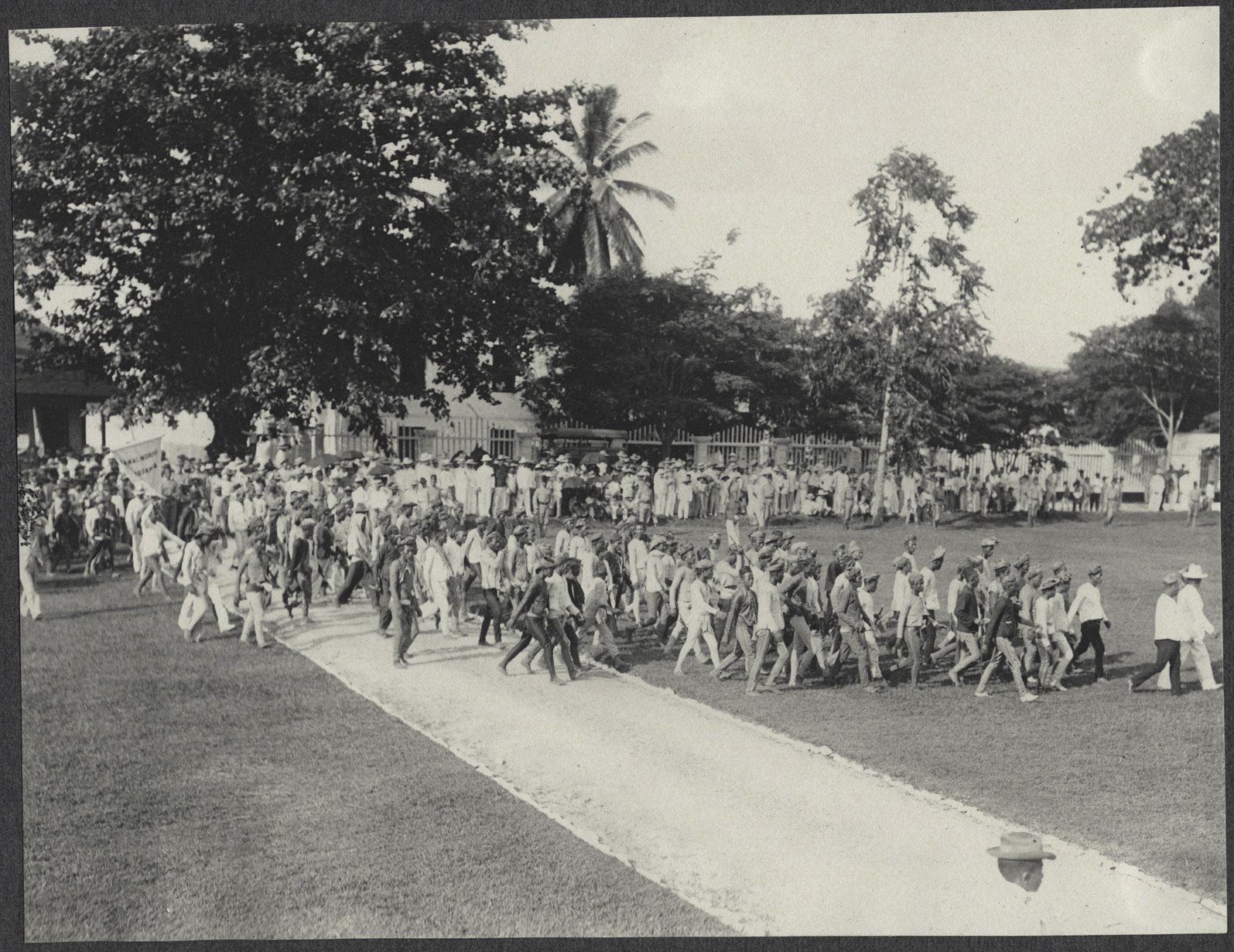 Zamboanga: Moros crossing the Zamboanga parade grounds