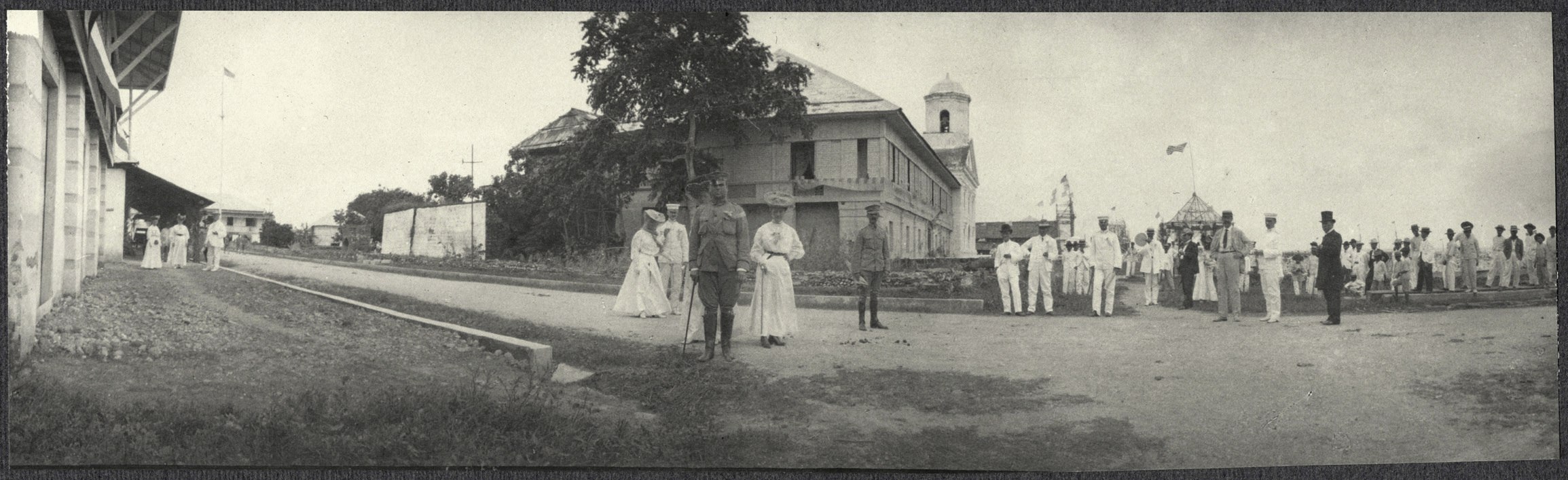 Americans on a town street, possibly Legazpi