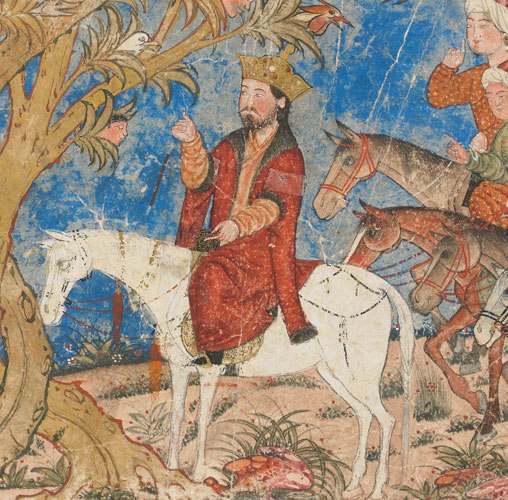 Iskandar near a tree with two trunks. One trunk sprouts male heads, while the other trunk sprouts female heads.