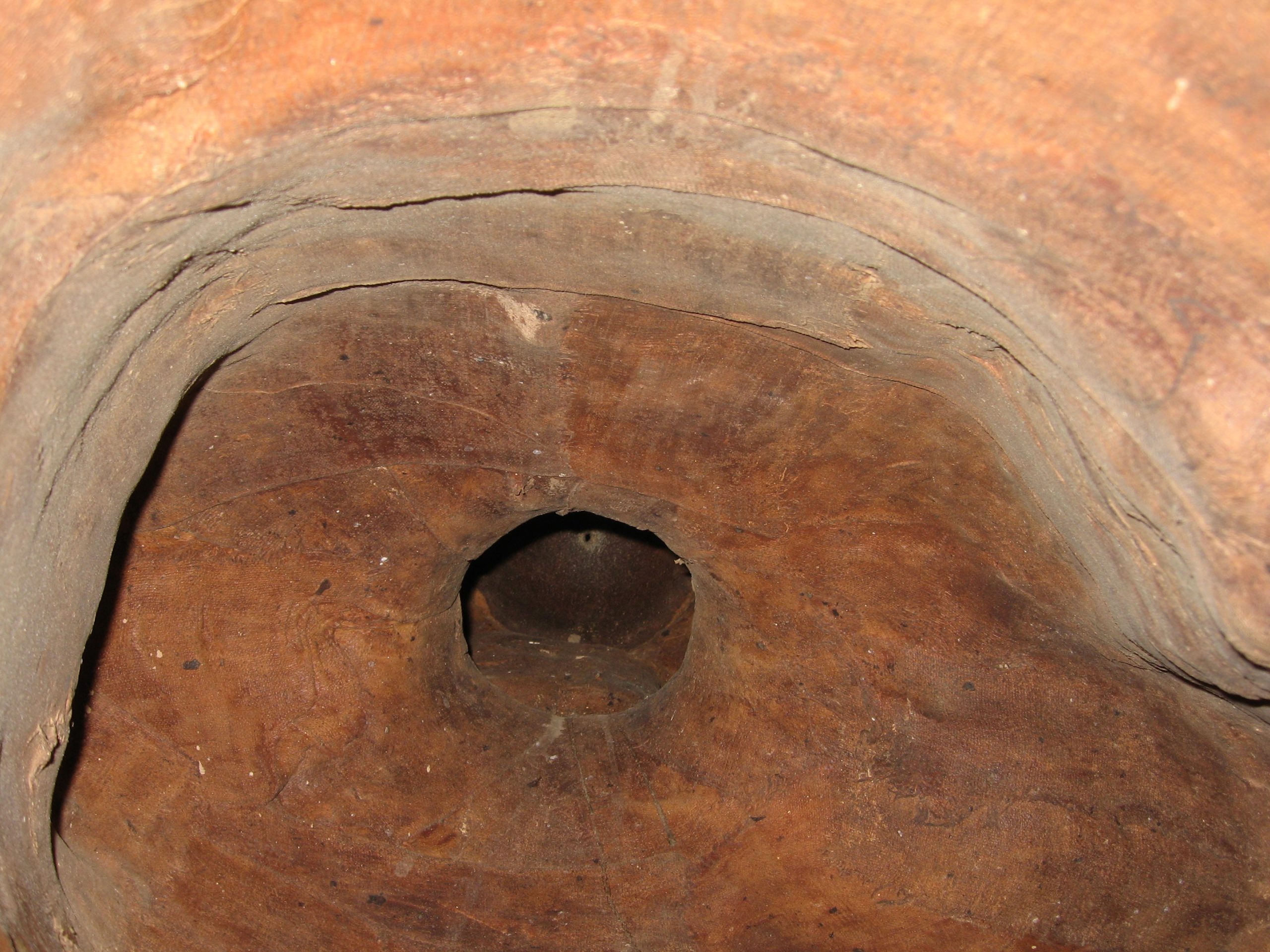 Close up view of hole inside hallow statue.