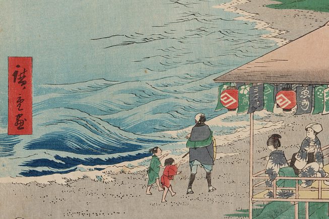 a detail of a woodblock print showing a body of water with waves, people walking along the beach and a stand.