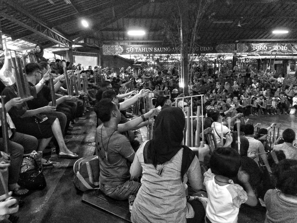Audience members playing angklung at the Bamboo Afternoon show