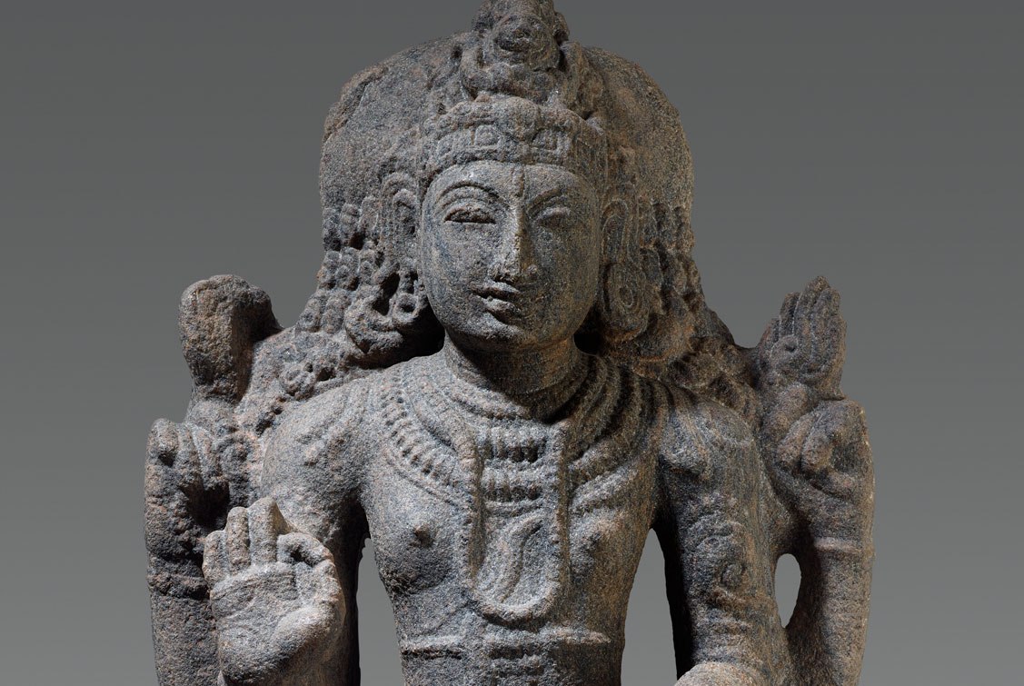 A granite sculpture of Shiva as Dakshinamurti, an 11th-12th century South Indian artwork