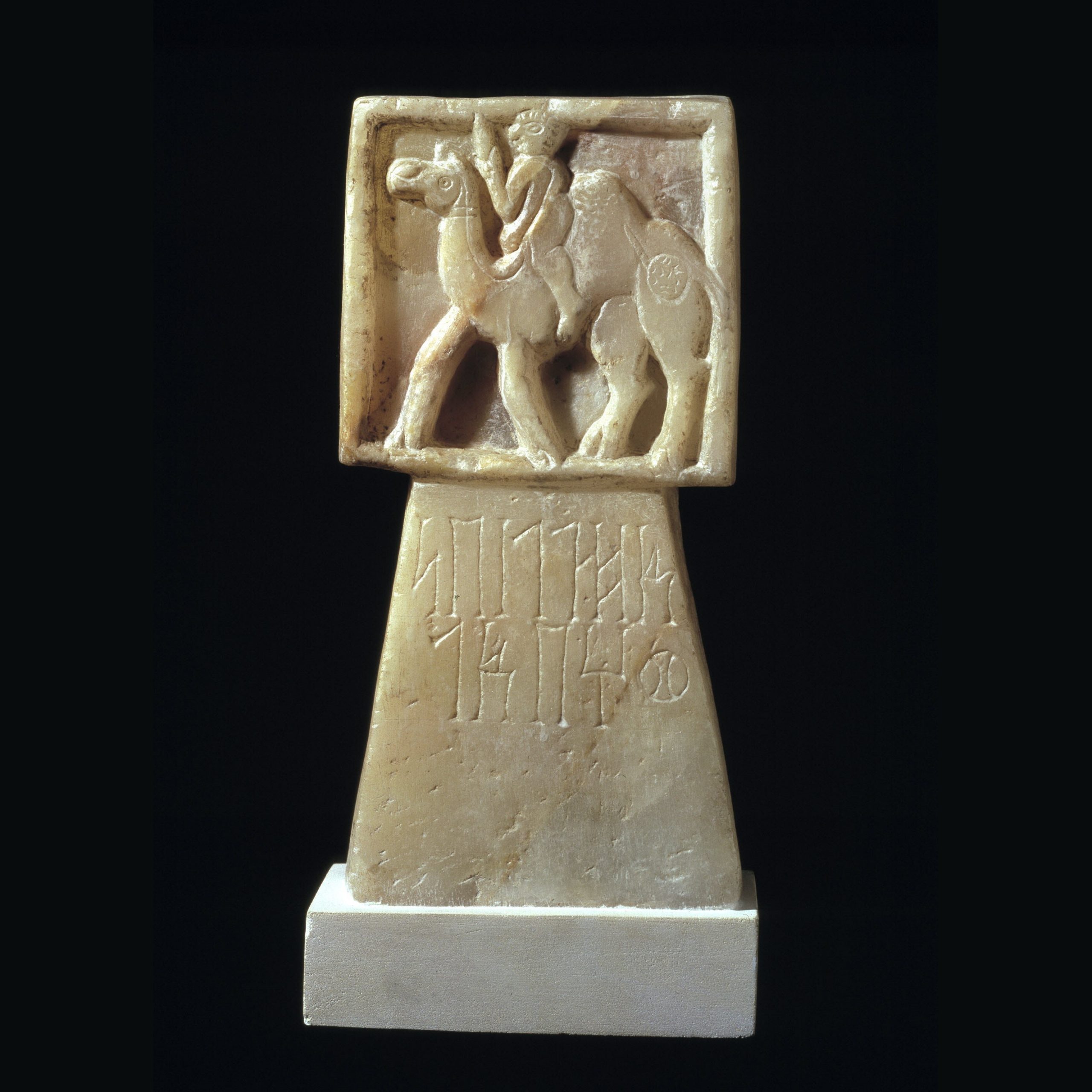 Alabaster incense burner showing a camel rider