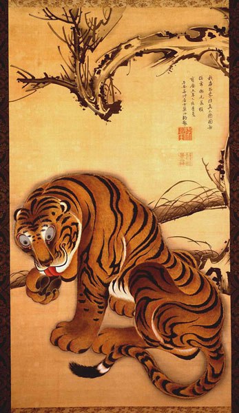 painted scroll of a tiger grooming itself