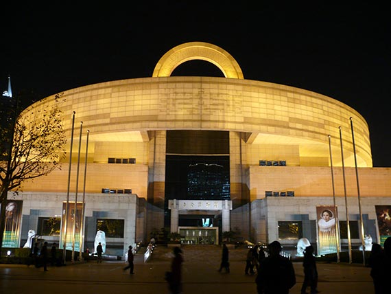 photo of golden lit Shanghai Museum